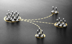 Customer or audience segmentation Marketing Concept - RQTech - RQTech Silver chess pieces clustered on gold bases, connected by yellow arrows showing movement between groups—illustrating strategy behavior.